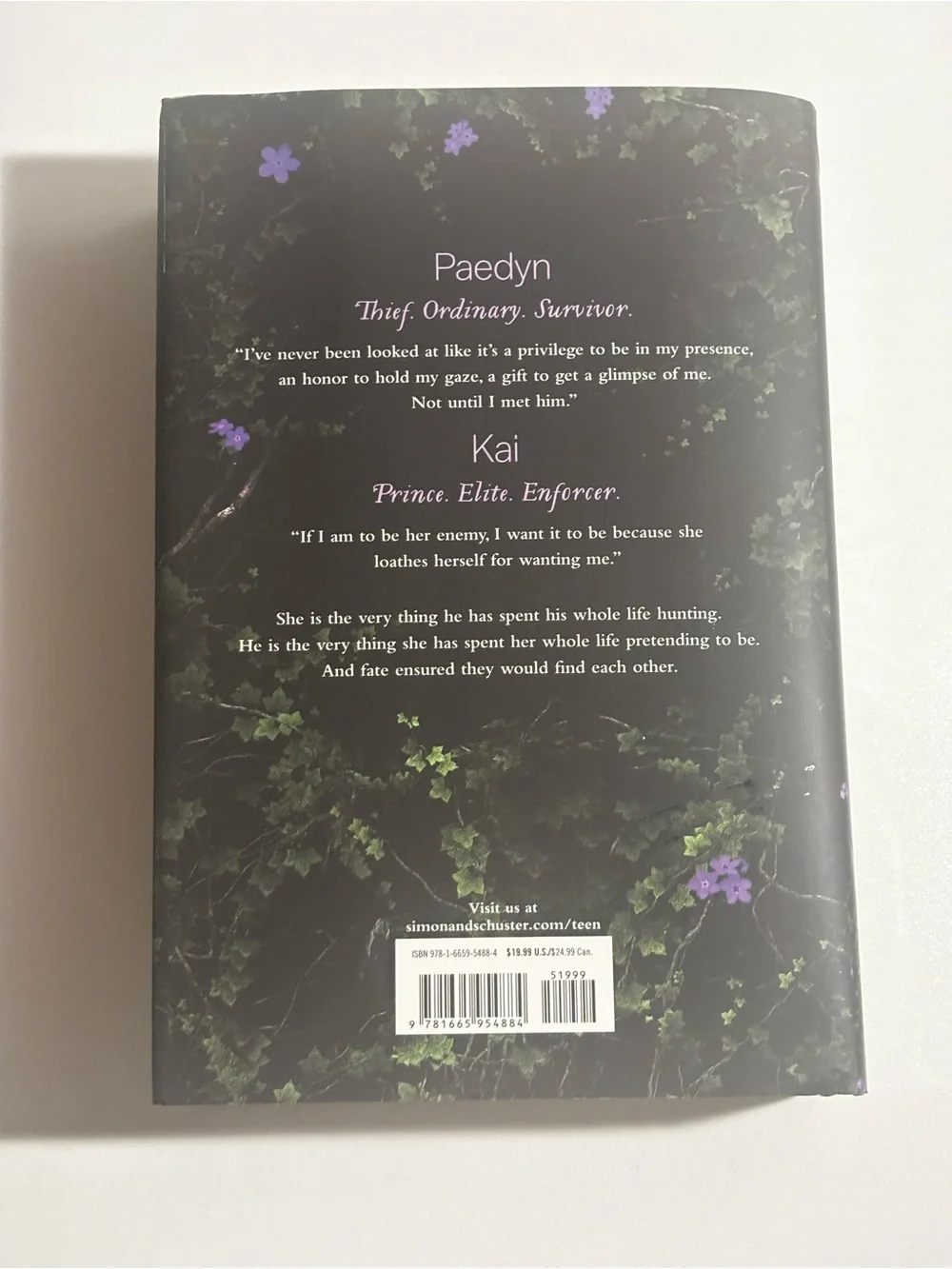 Powerless by Lauren Roberts - Black Cover with Purple Floral Accents